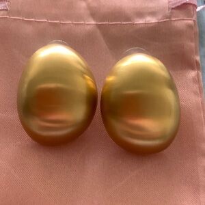 BOLD brushed gold tone studs.